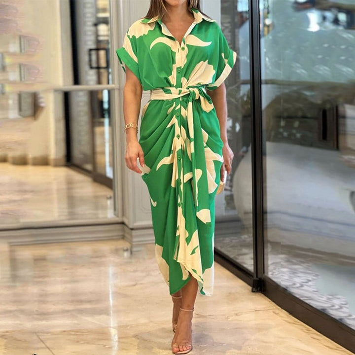 Green abstract print wrap midi dress with short sleeves and belted waist