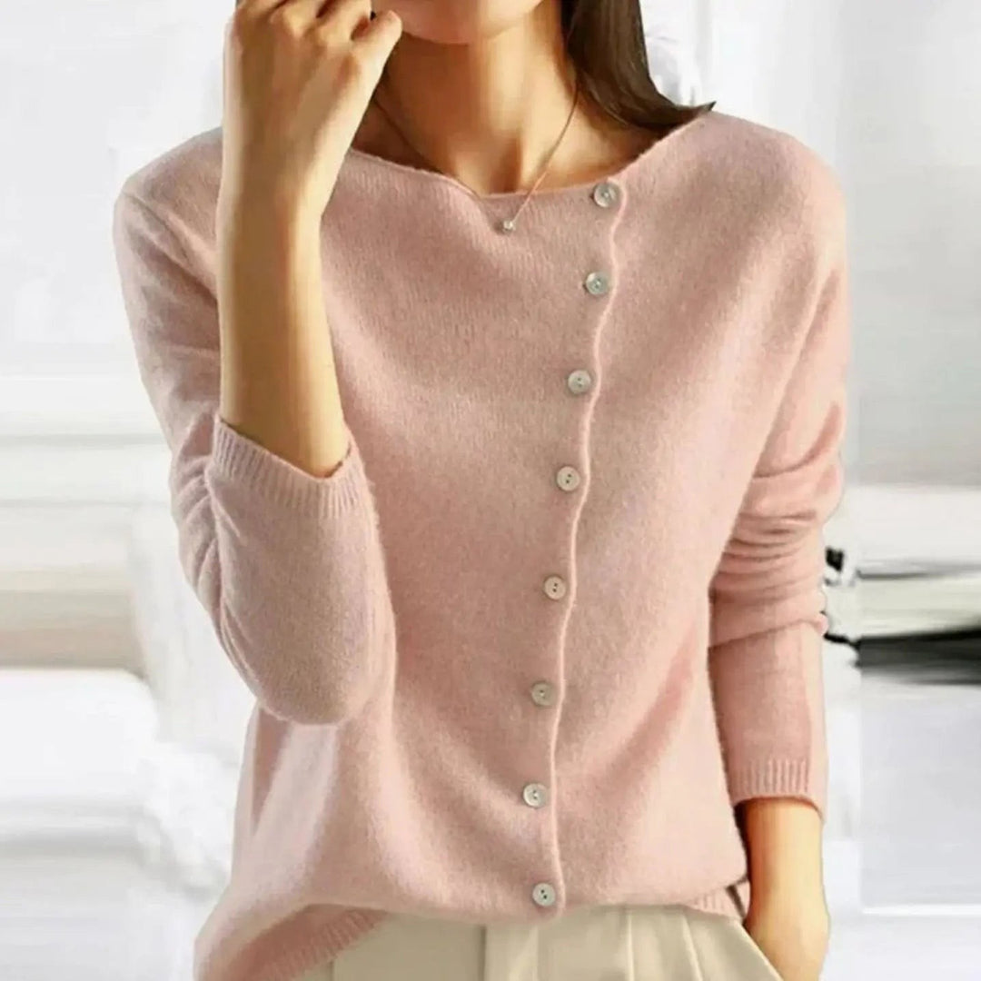 Blush pink knitted jumper with asymmetric button front and long sleeves