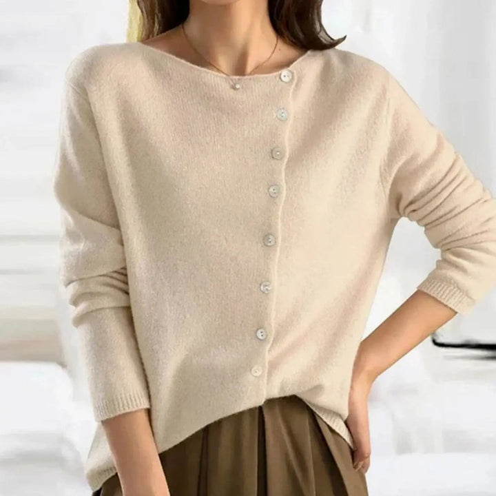Oatmeal beige relaxed fit jumper with diagonal button placket design