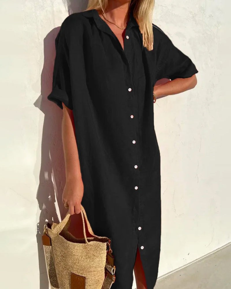 Black midi shirt dress featuring collared neckline and short sleeves