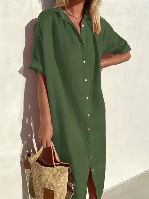 Olive green midi shirt dress styled with woven straw tote bag