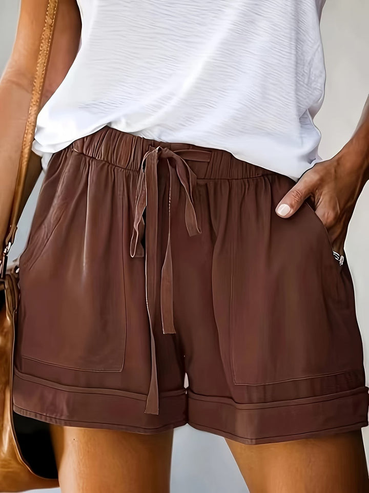 Chocolate brown drawstring shorts with elasticated waistband and front pockets