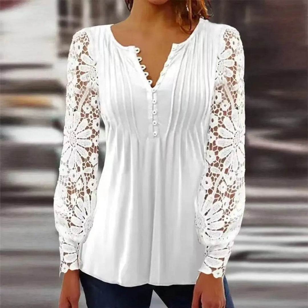 White henley blouse with sheer floral lace sleeves and pintuck front