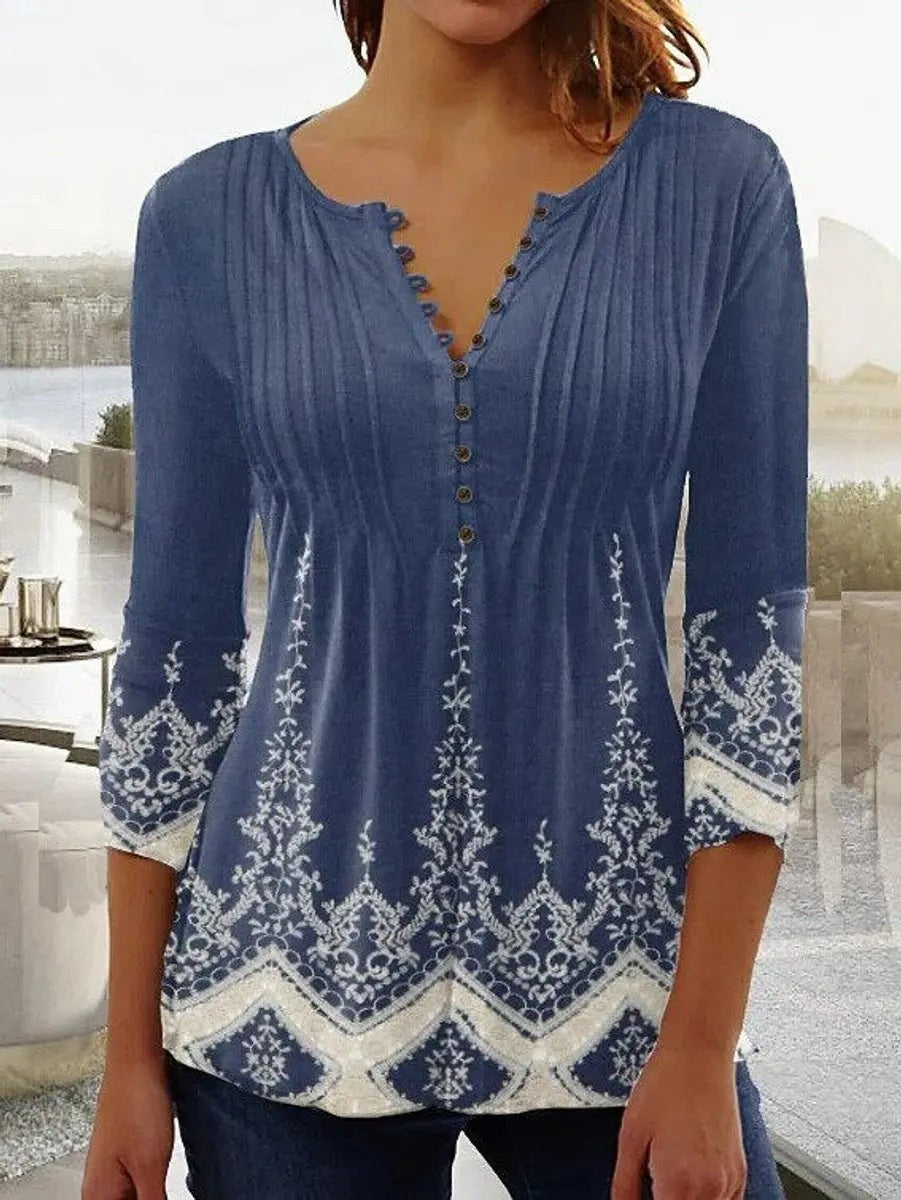 Blue henley blouse with paisley border print and three-quarter sleeves