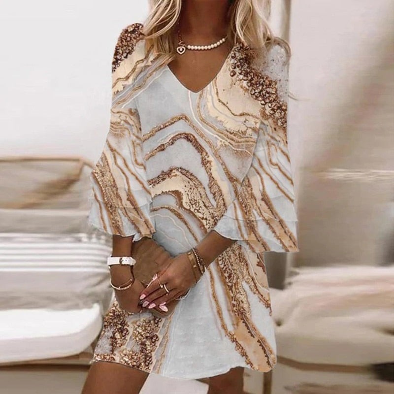 V-neck mini dress with beige marble print and flared sleeves