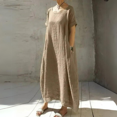 Beige linen short-sleeve caftan maxi dress with round neckline and loose fit