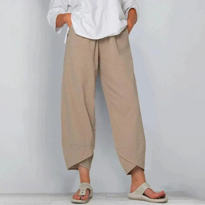 Beige linen-look lantern trousers with elasticated waist and cross-hem detail