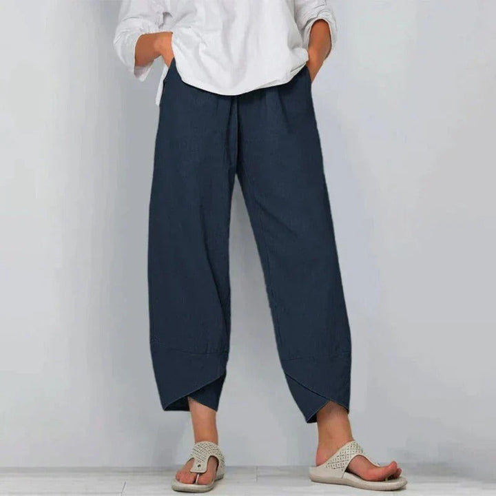 Navy linen-look trousers with drawstring waist and asymmetric ankle hem