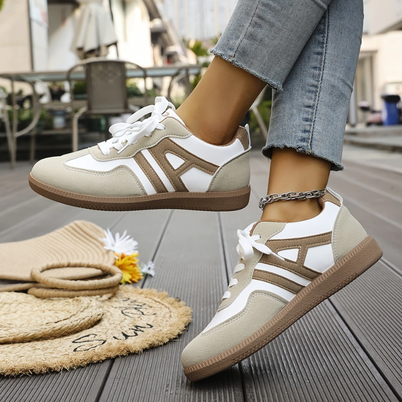 Tan-striped lace-up trainers with white leather panels and thick gum sole