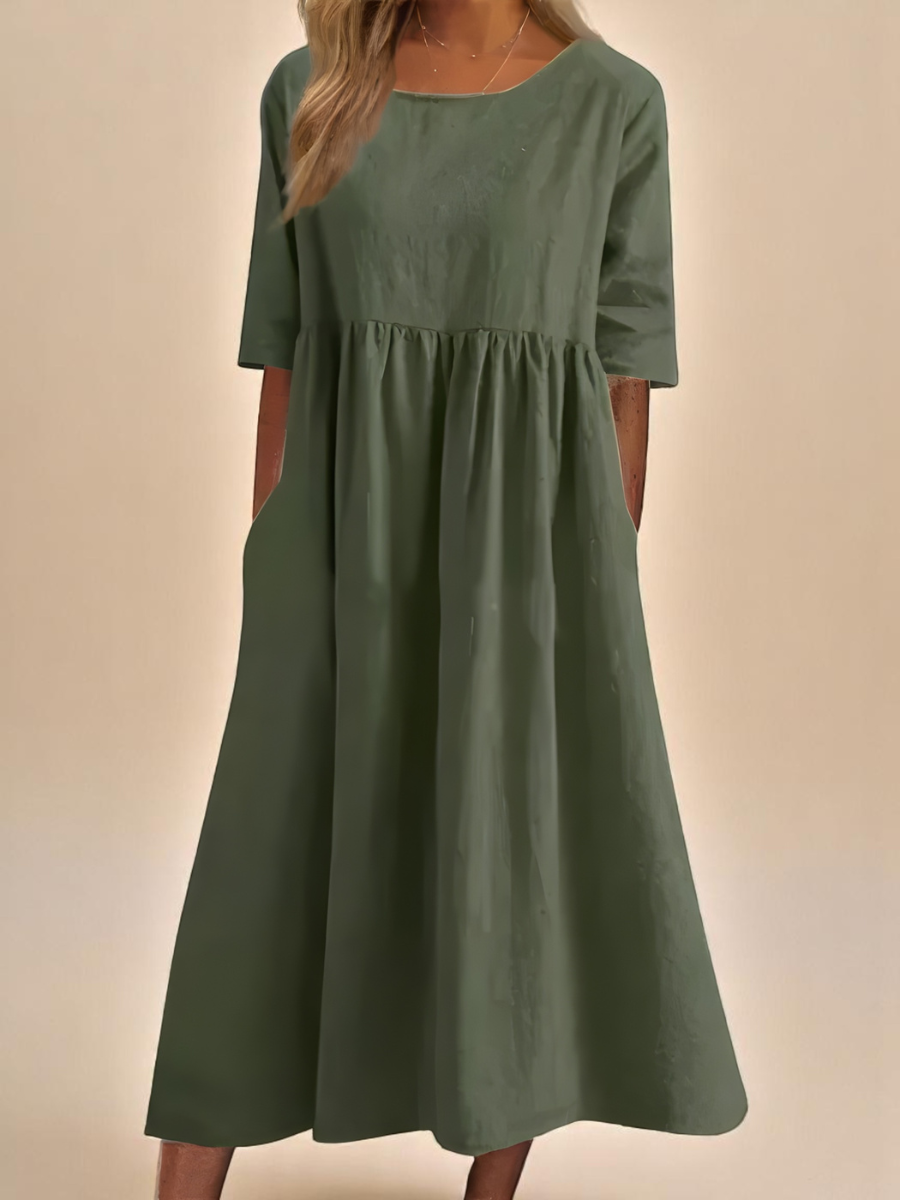 Sage green midi dress with round neck and relaxed A-line cut