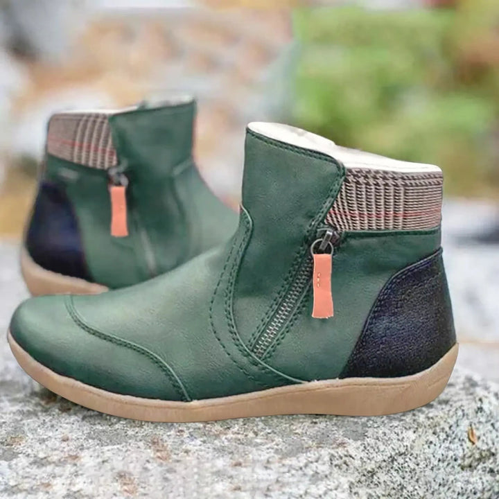 Green leather ankle boots with houndstooth trim and side zip detail