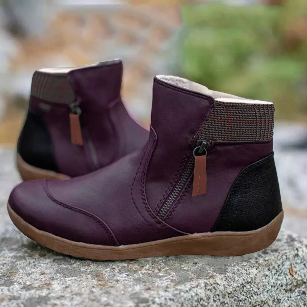 Purple leather ankle boots with black heel panel and tweed collar