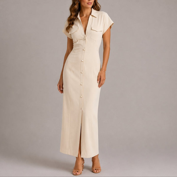 Cream button-down maxi shirt dress featuring chest pockets and front slit