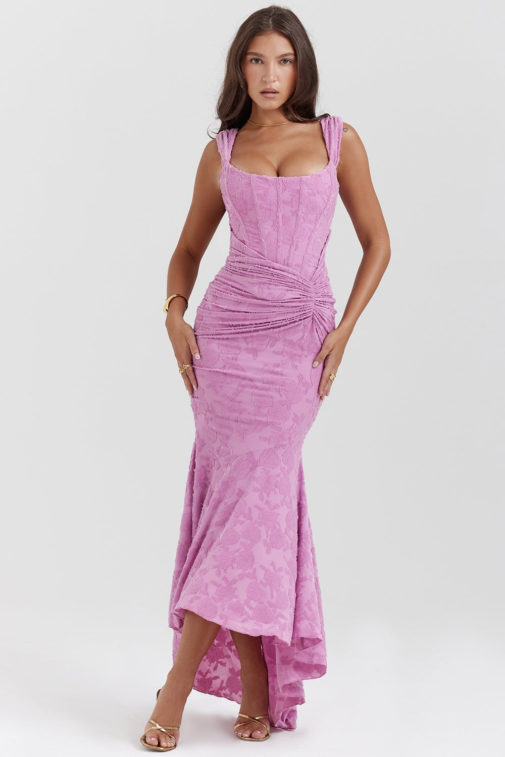 Pink floral lace corset gown with ruched waist and dipped hem