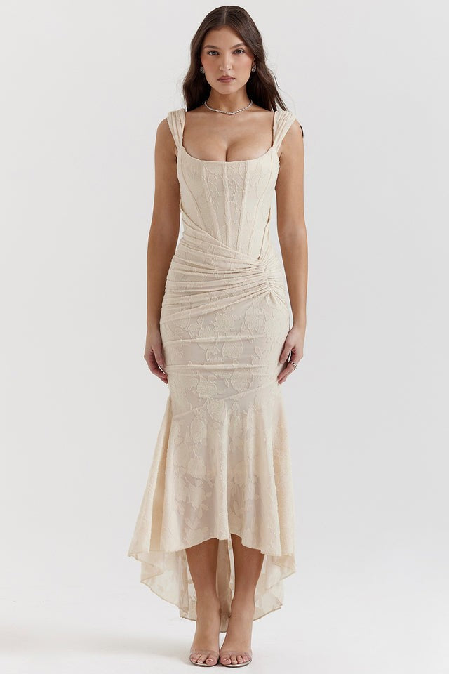 Cream lace bodycon dress with ruched waist and asymmetric hem