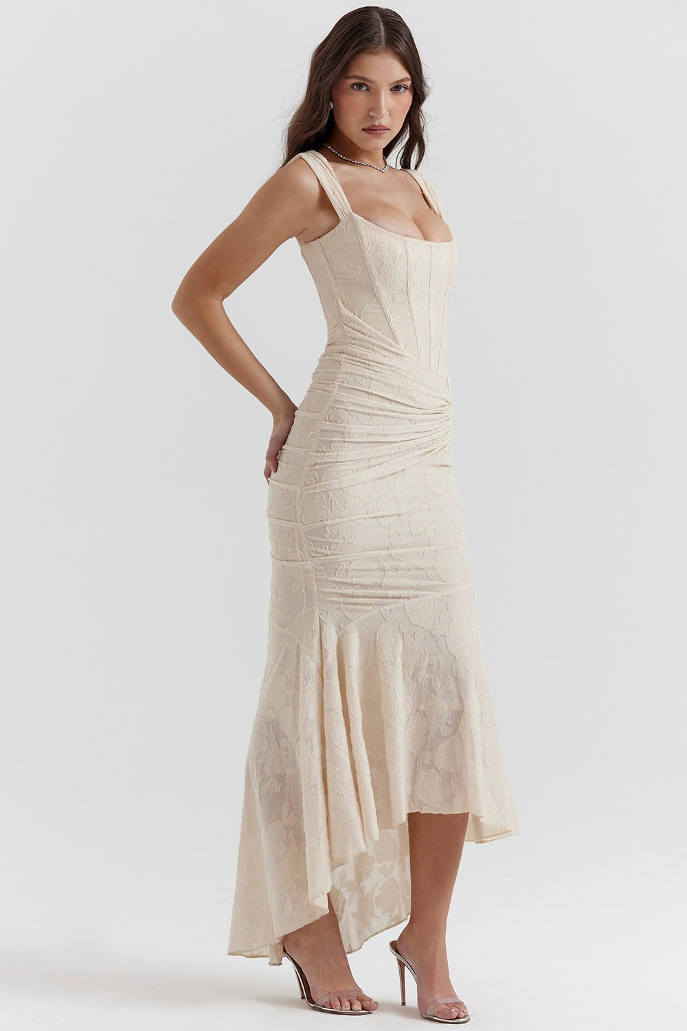 Cream lace corset gown with fitted bodice, side view