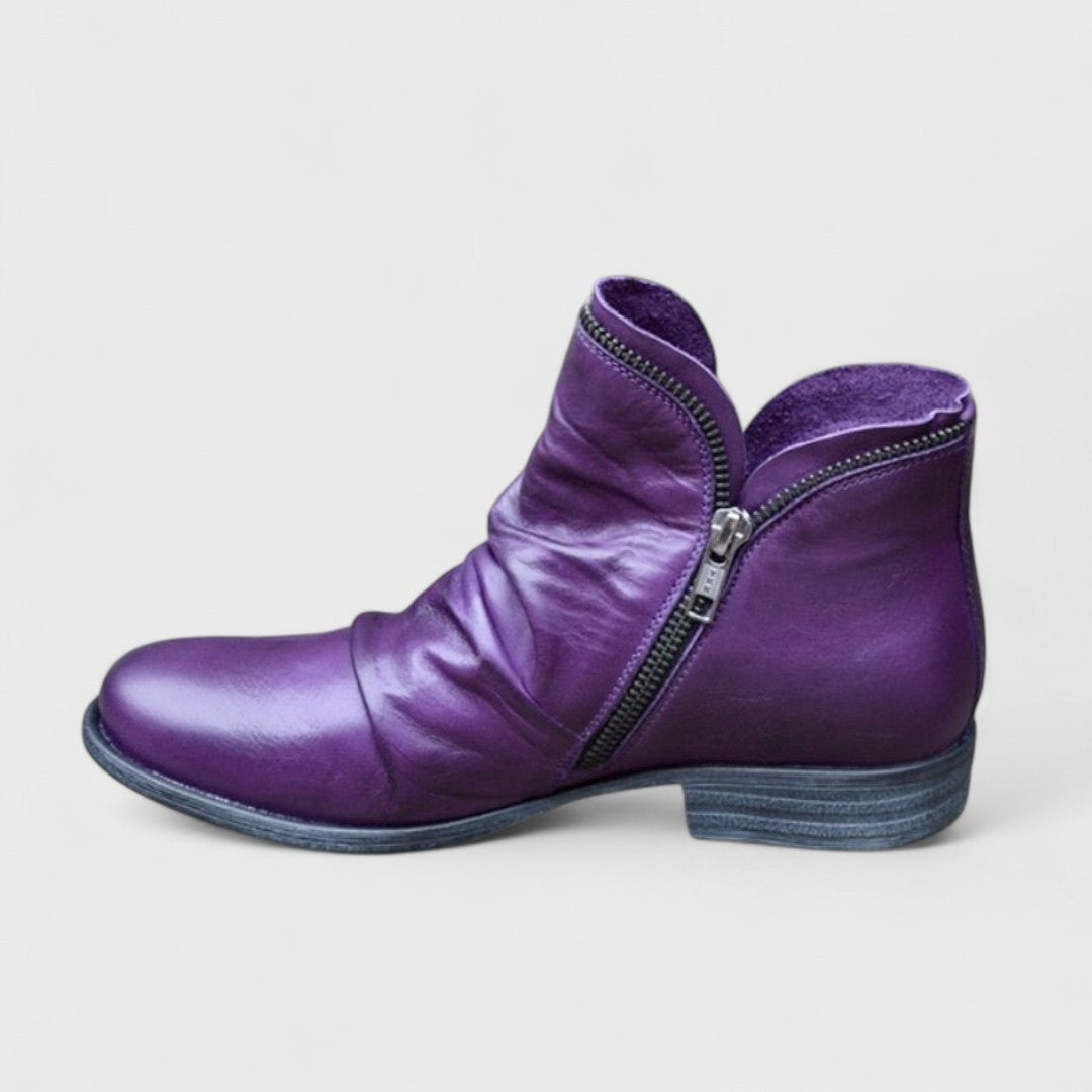 Purple leather ankle boot with ruched vamp and side zip detail