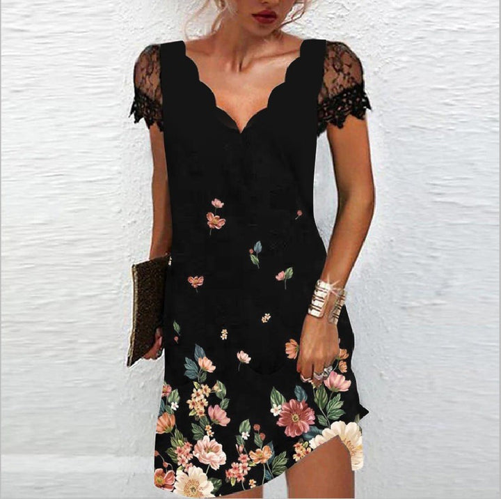 Black lace-sleeve dress with colourful floral print along the hemline