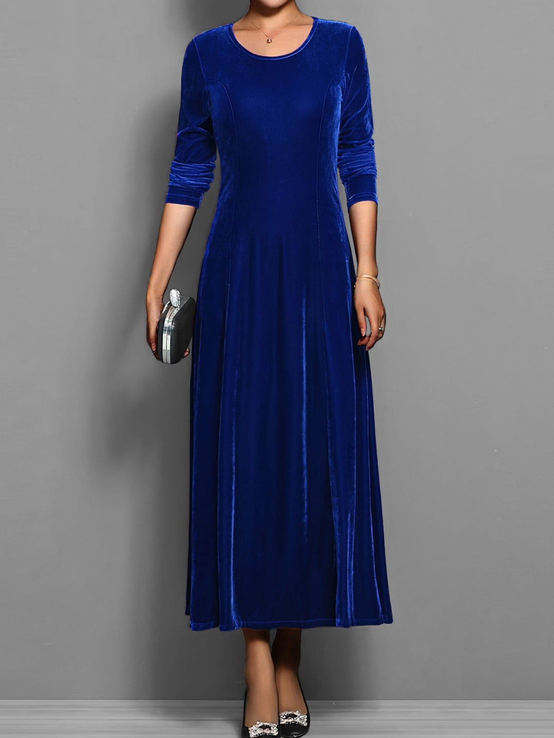 Royal blue velvet maxi dress with long sleeves and round neckline, front view