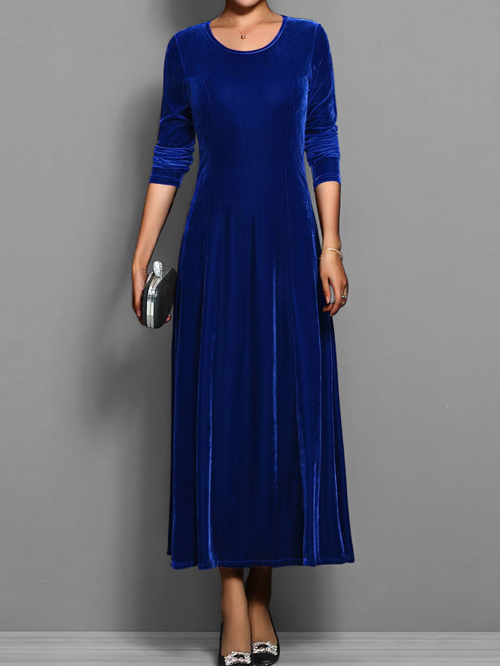 Royal blue velvet maxi dress with long sleeves and round neckline, front view
