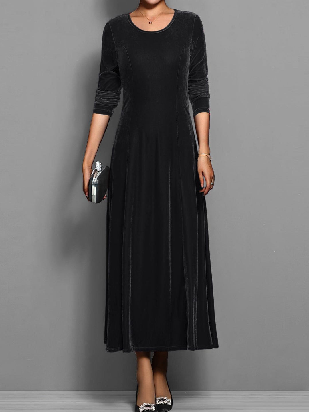 Black velvet maxi dress with long sleeves and round neckline, front view