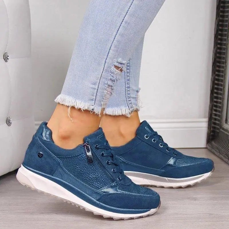 Blue suede lace-up trainers featuring side zip and studded detail