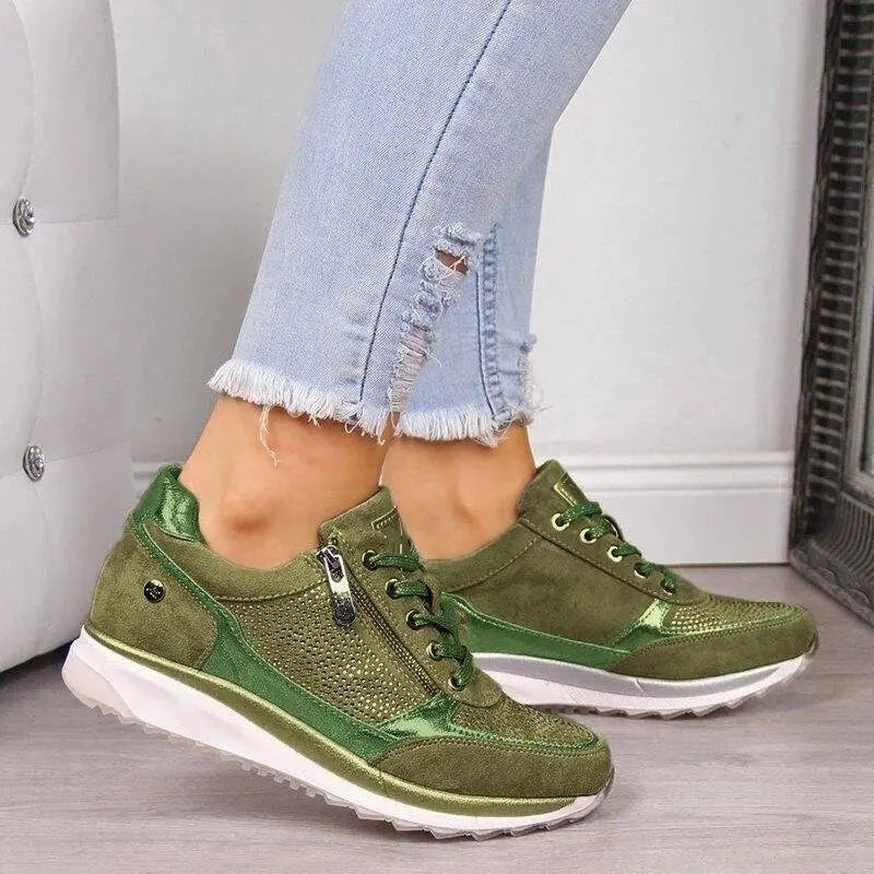 Khaki green suede trainers with metallic panels and side zip fastening