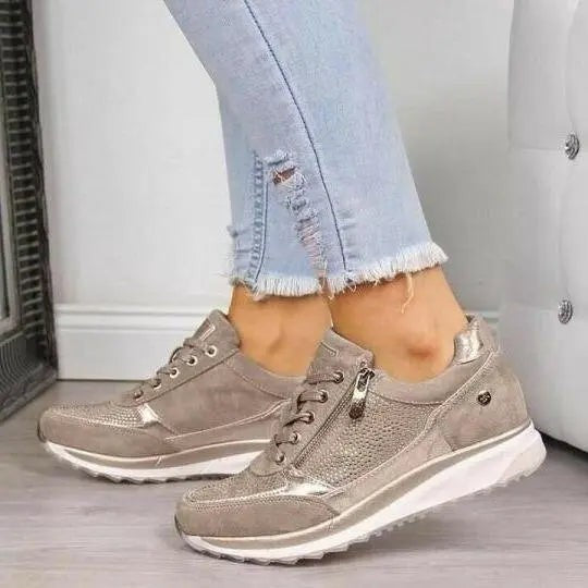 Taupe suede zip trainers with metallic accents and chunky sole