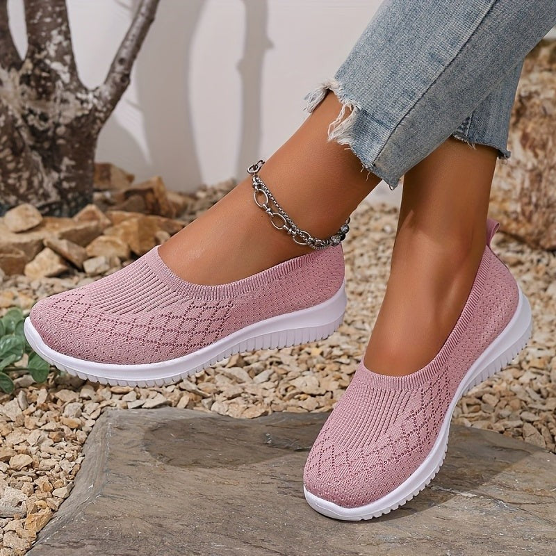 Pink knit slip-on trainers showing soft mesh upper and white sole