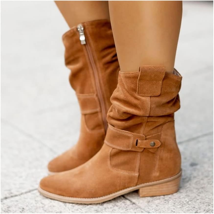 Tan suede slouchy ankle boots with buckle detail and side zip