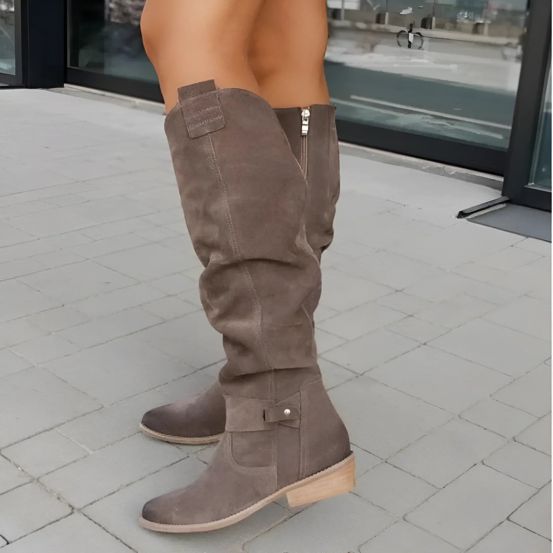 Grey suede knee-high boots with side zip and stacked wooden heel