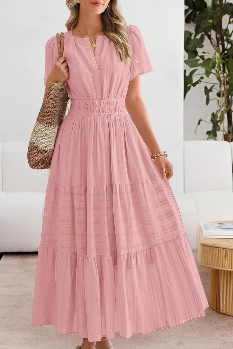 Dusky pink tiered maxi dress with cinched waist and short sleeves