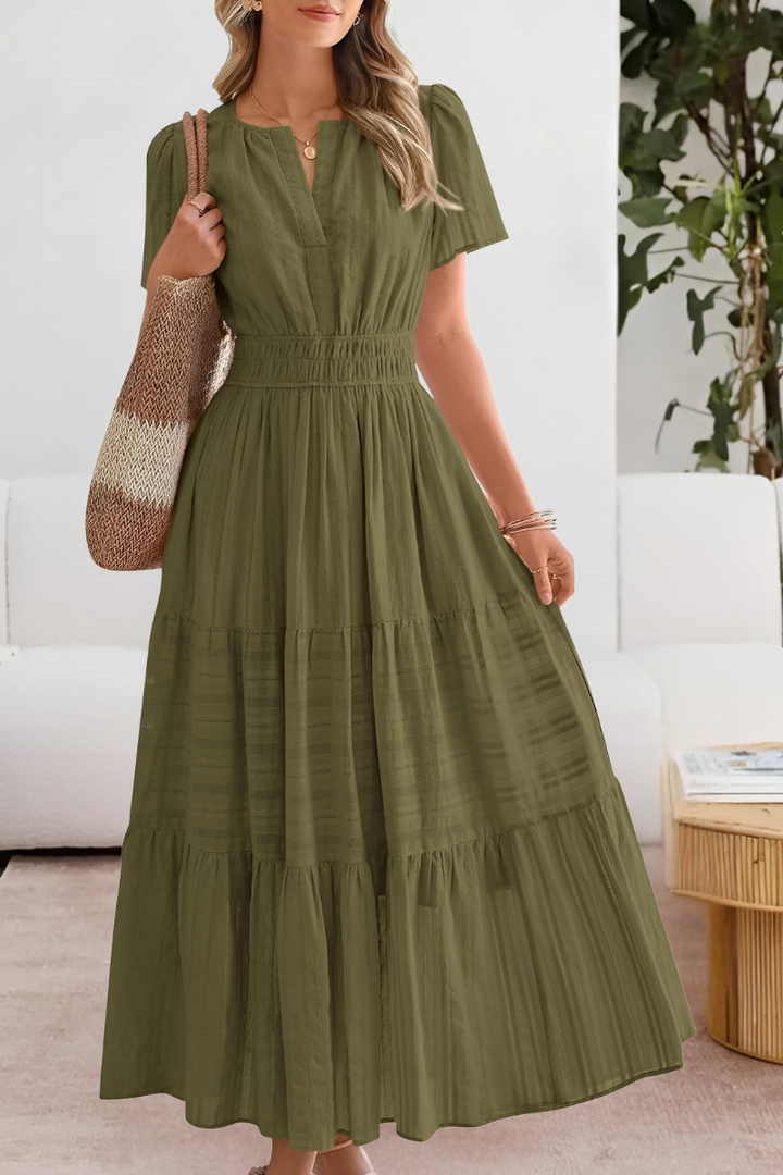 Olive green tiered maxi dress featuring split neckline and puff sleeves