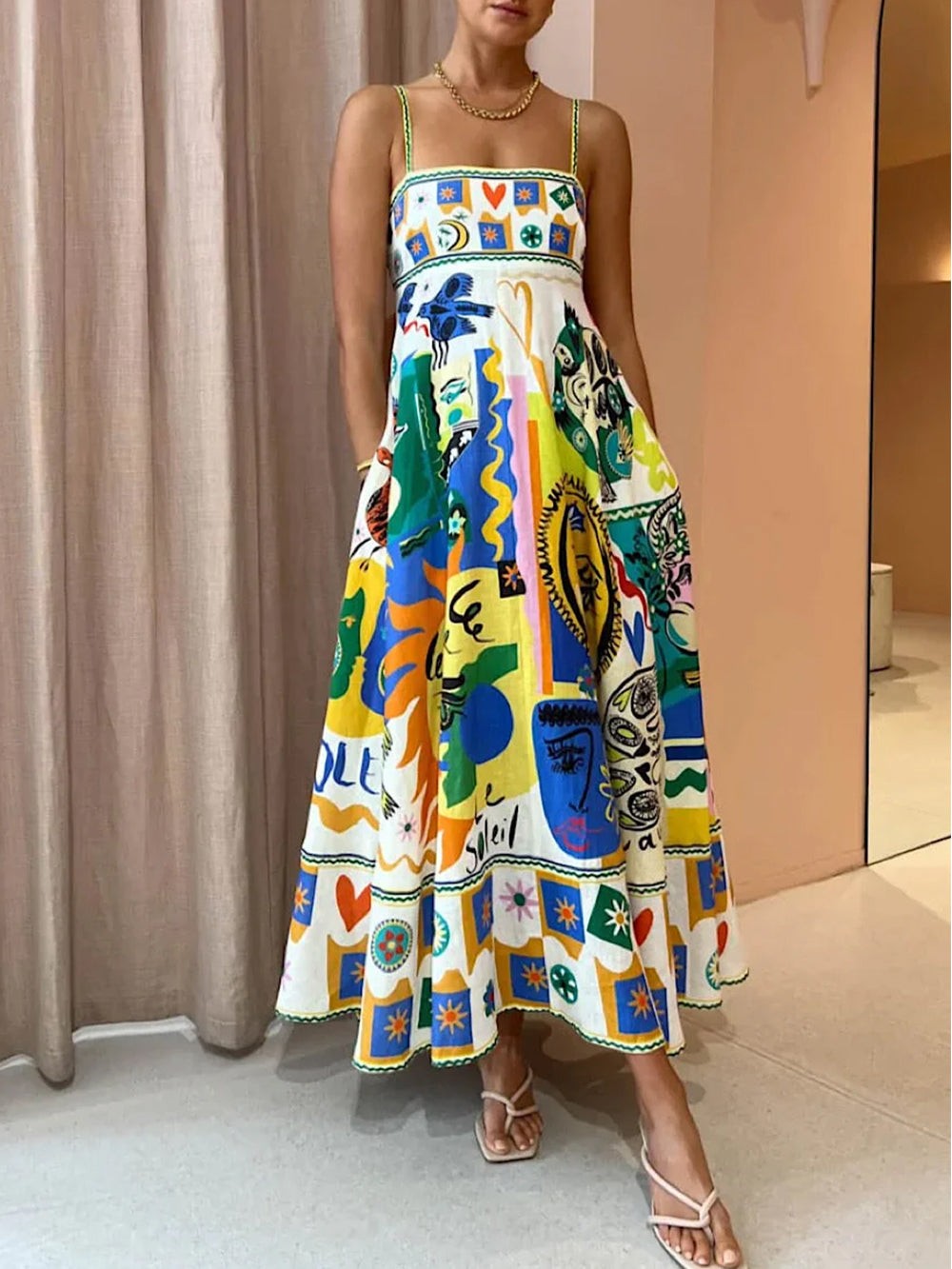 Abstract art print maxi dress with spaghetti straps and full skirt