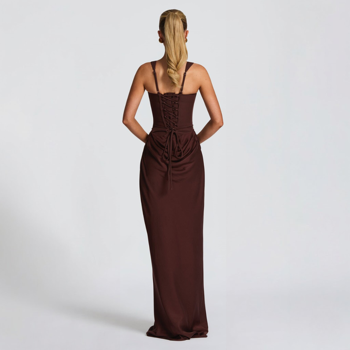 Brown maxi dress rear view showing lace-up corset back and draped skirt