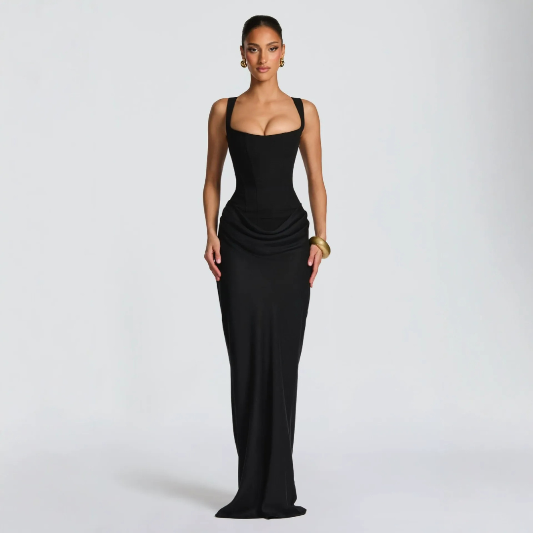 Black square neck corset gown with draped hip detail and floor-length skirt