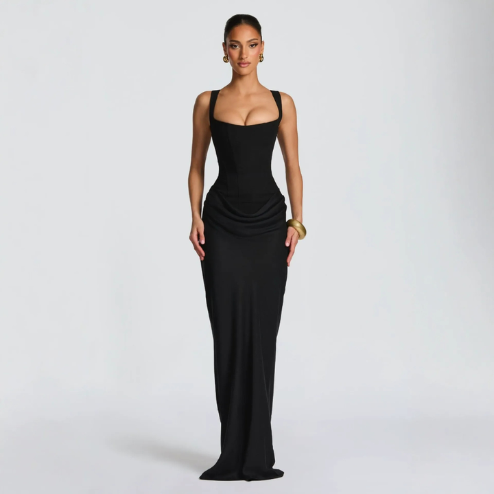 Black square neck corset gown with draped hip detail and floor-length skirt