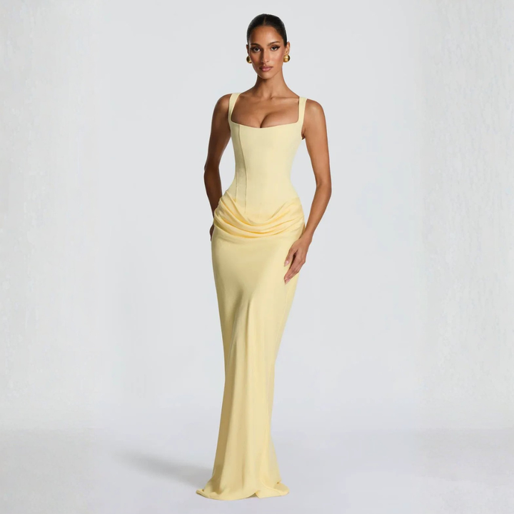Pale yellow draped corset gown with square neck and figure-hugging silhouette