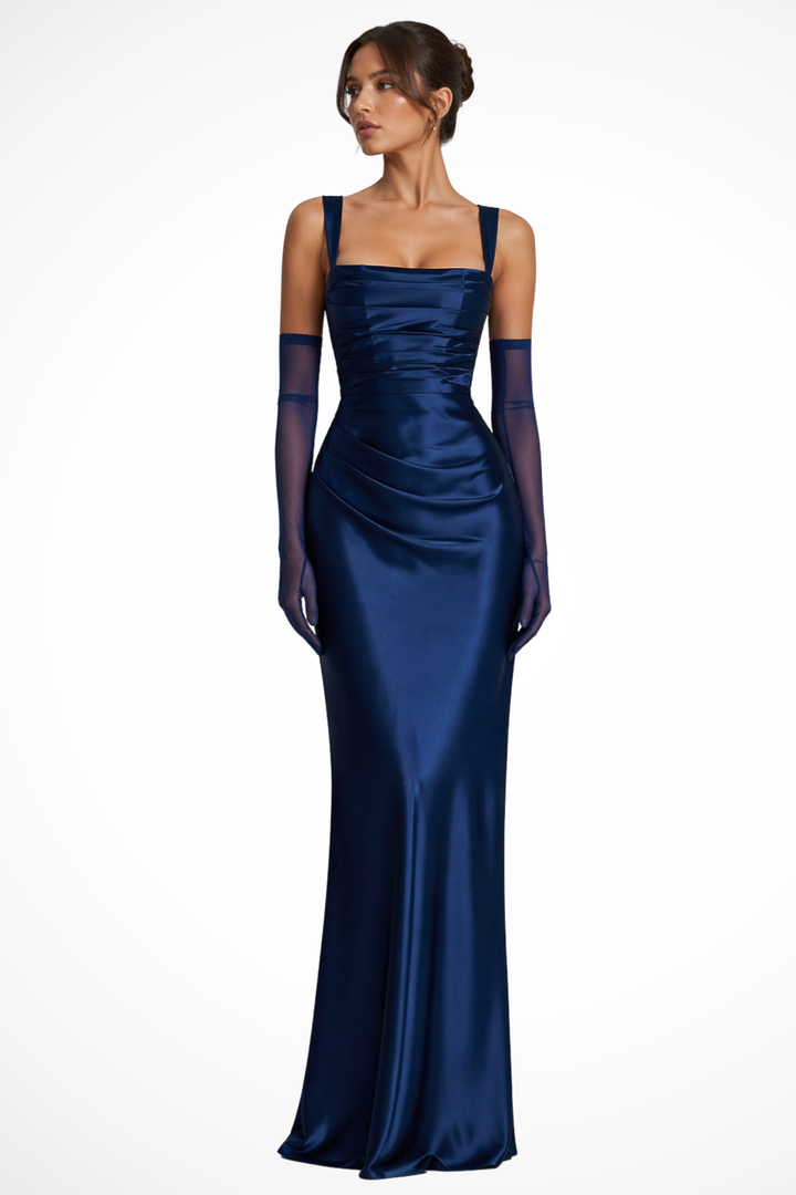 Navy satin square-neck evening gown paired with sheer opera gloves