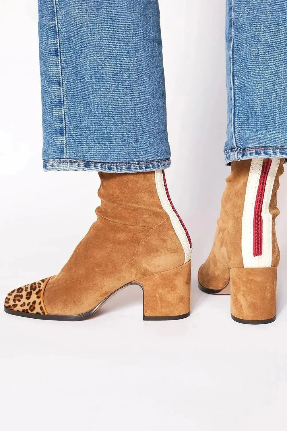 Tan suede ankle boots with leopard-print cap toe and stacked heel