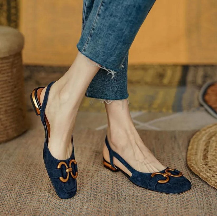 Navy suede slingback sandals with gold-tone chain buckle and block heel