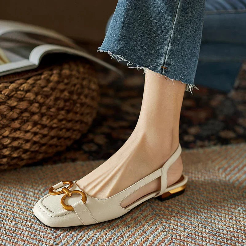 Cream leather slingback sandals with square toe and gold chain buckle