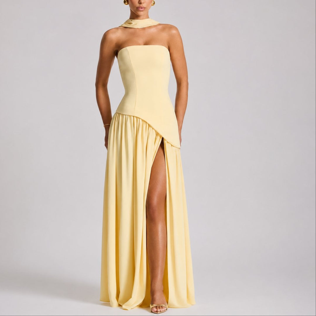 Pale yellow strapless maxi dress with halter neck scarf and thigh split