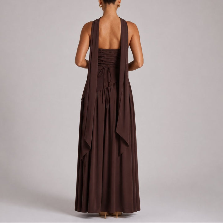 Rear view of brown maxi dress showing halter scarf and lace-up bodice