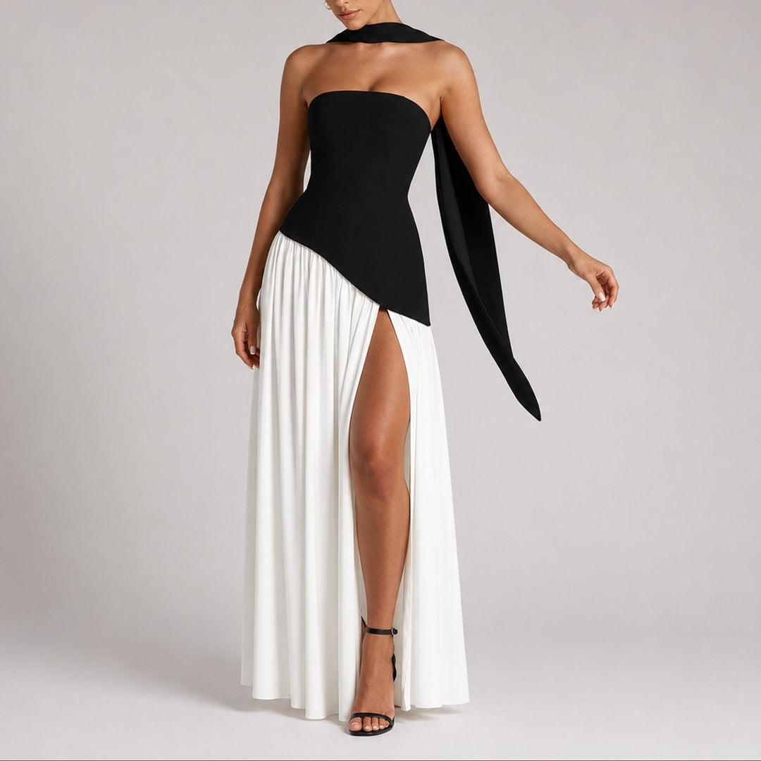 Monochrome strapless gown with black bodice and white pleated split skirt