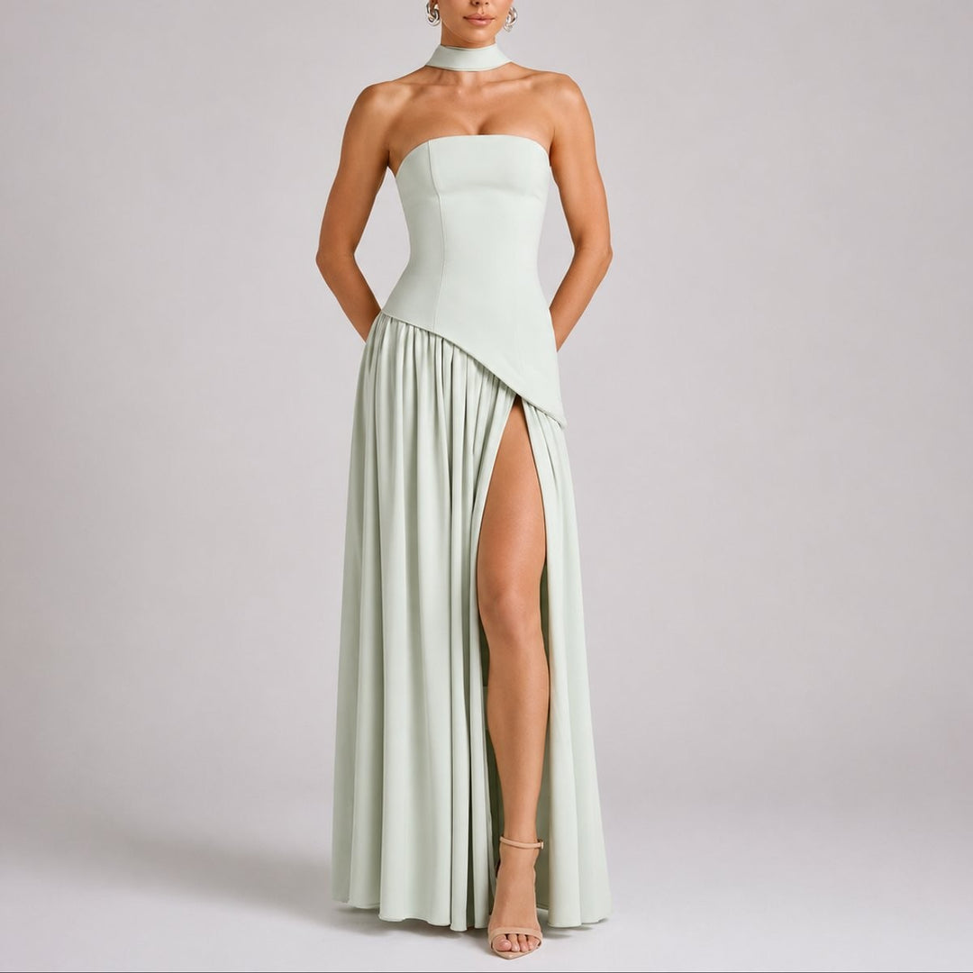 Sage green strapless maxi dress featuring asymmetric hem and high thigh split