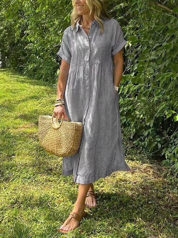 Grey striped midi shirt dress paired with tan leather sandals and tote