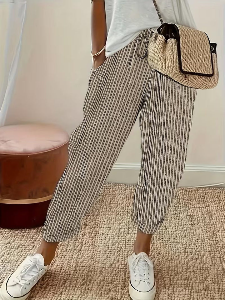 Beige striped wide-leg trousers with turn-up cuffs and elasticated waist