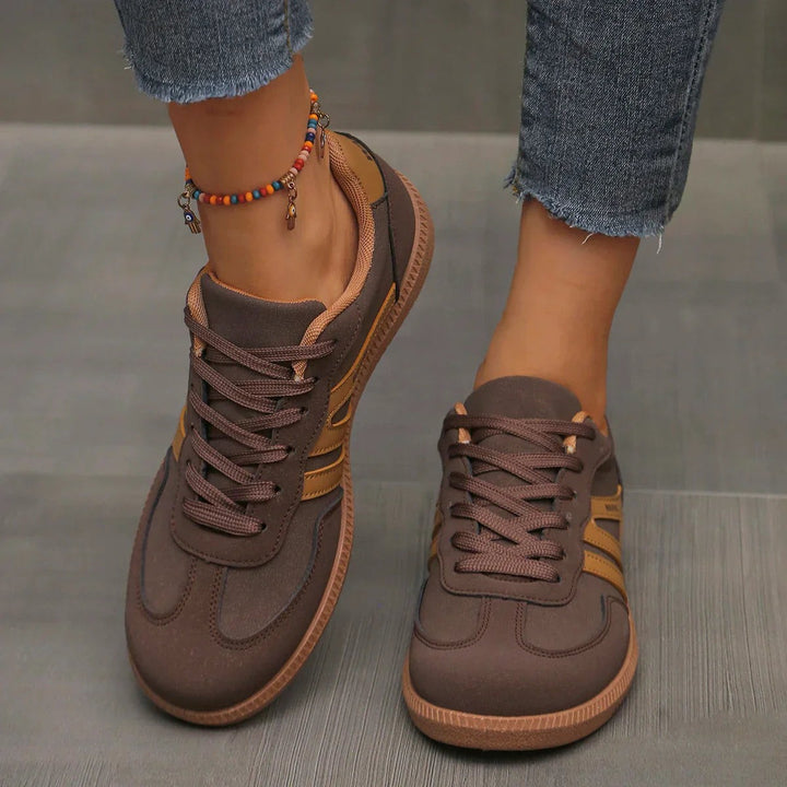 Brown suede lace-up trainers with mustard stripe accents