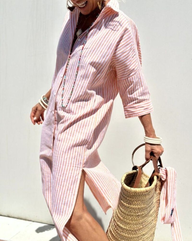 Coral striped button-front shirt dress worn open with woven tote